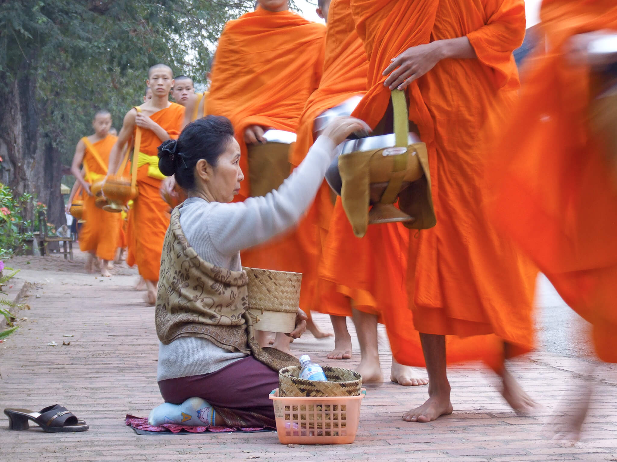 Alms offered by local residents